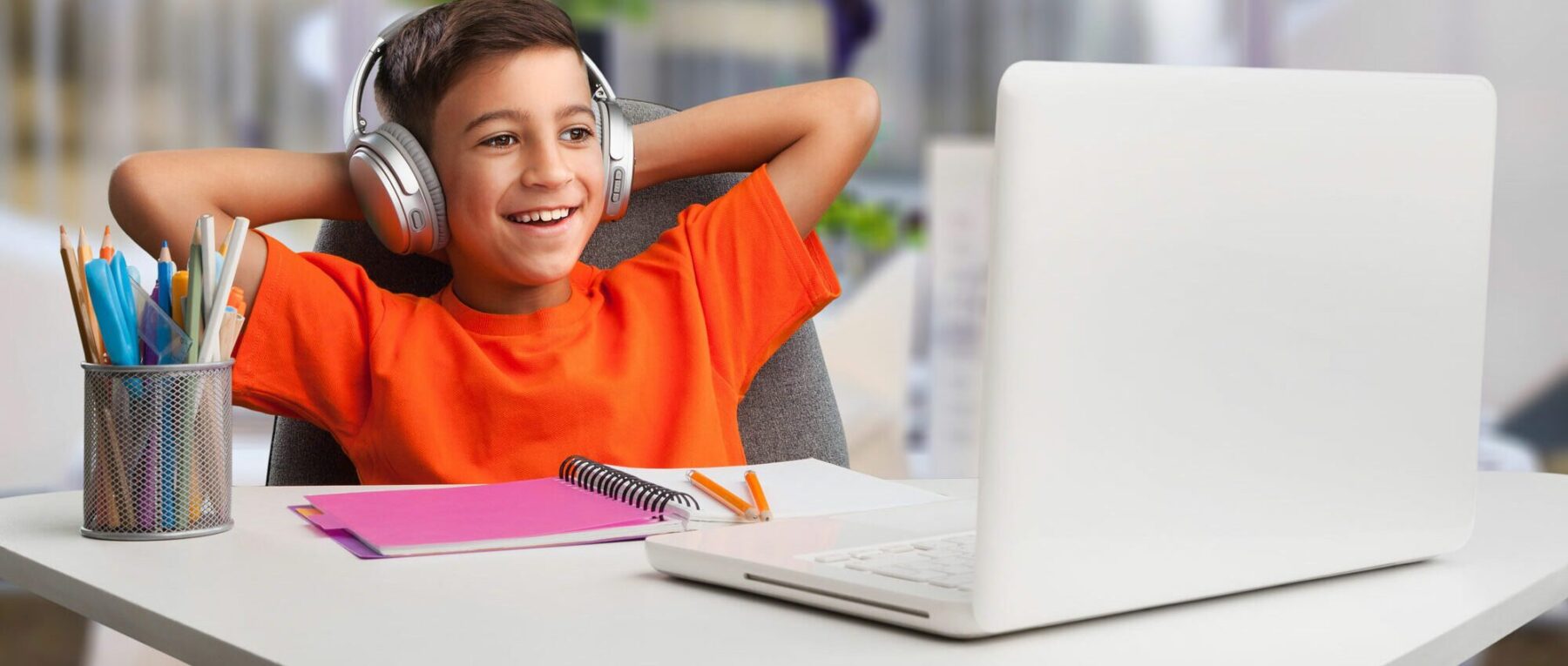 boy wearing headphones attending Virtual Prep of West Virginia online middle school